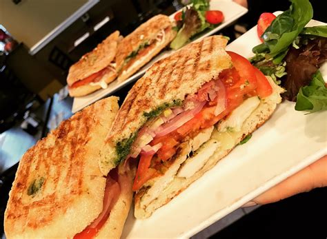 Panini rustico - Grilled Chicken & Melted Mozzarella. $14.49+. P40. Grilled eggplant and zucchini panini with black olives, mozzarella, fire roasted red peppers, fresh basil and balsamic glaze. $14.99+. P41. Grilled chicken panini with fontina cheese, avocado & sun dried tomato. 